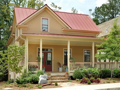 yellow house with red metal roof|tin colors for homes.